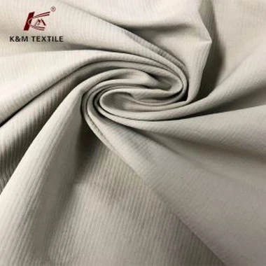 Tejido de punto por urdimbre de nailon con barra lateral en jacquard